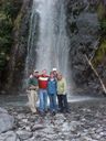 team under waterfall